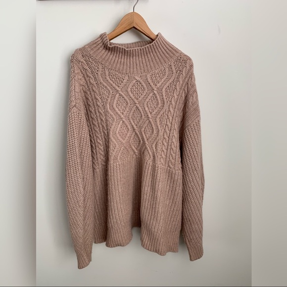 Oversized knitted turtleneck in dusty pink - Picture 1 of 4